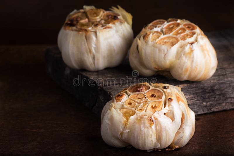 Roasted garlic stock photo. Image of heads, garlic, olive 50827452