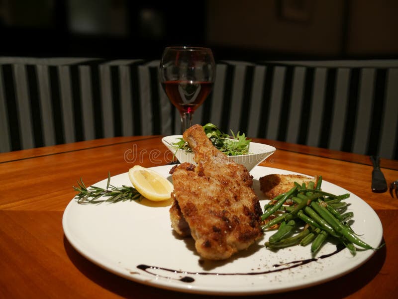 Roasted Chicken with Green Beans and Vegetables Served with Red Wine