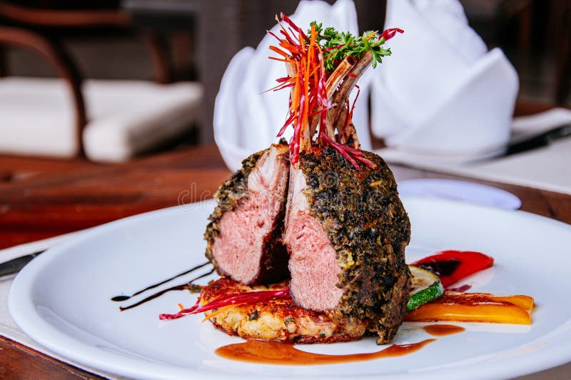 Roasted Lamb chop steak with crispy herb crust and grilled vegetables