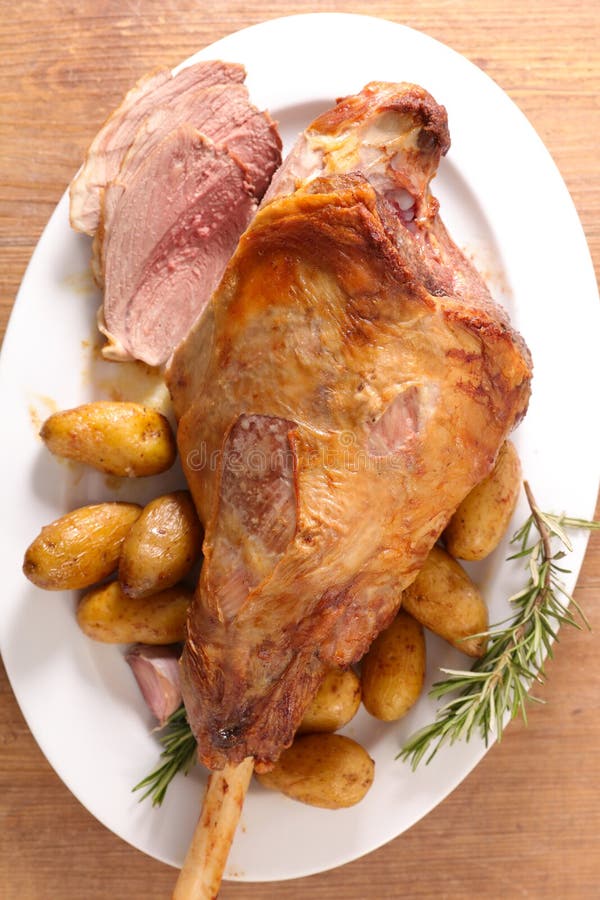 Roasted Lamb Leg with Potatoes Stock Photo Image of cuisine, family