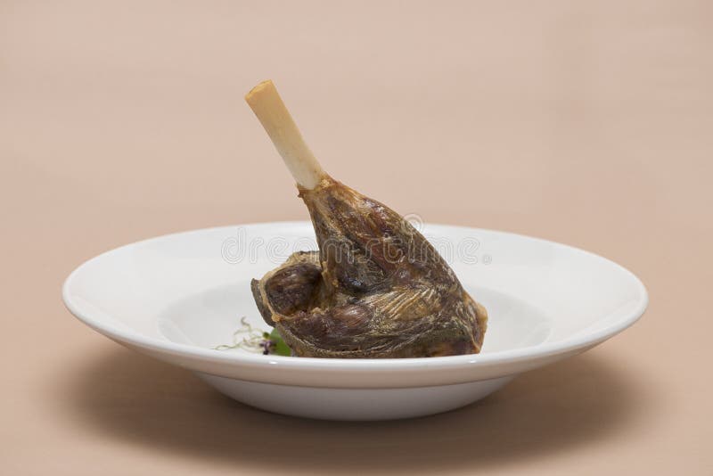 Roasted Lamb Leg, Served with White Sauce, Decorated with Herbs Stock