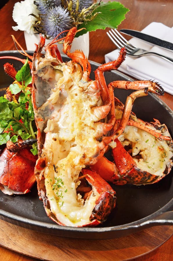 Lobster Roasted On Metal Tray Red Armor And White Meat Closeup Stock