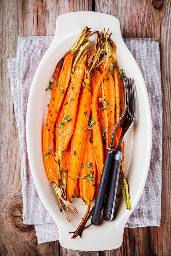 Roasted Organic Carrots with Thyme Stock Photo Image of food, angle