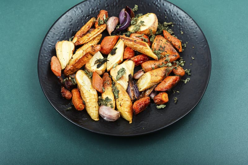 Roasted parsnip root and carrots royalty free stock images