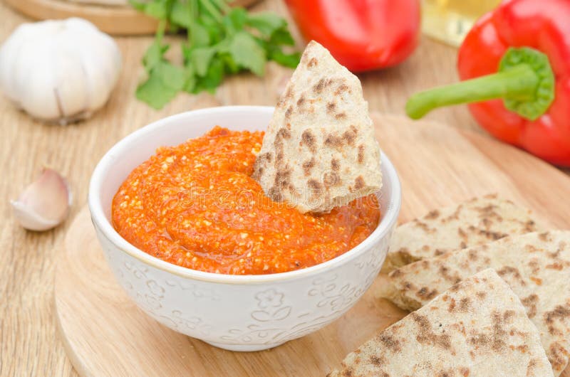 Roasted pepper dip with almonds, garlic and whole-grain bread