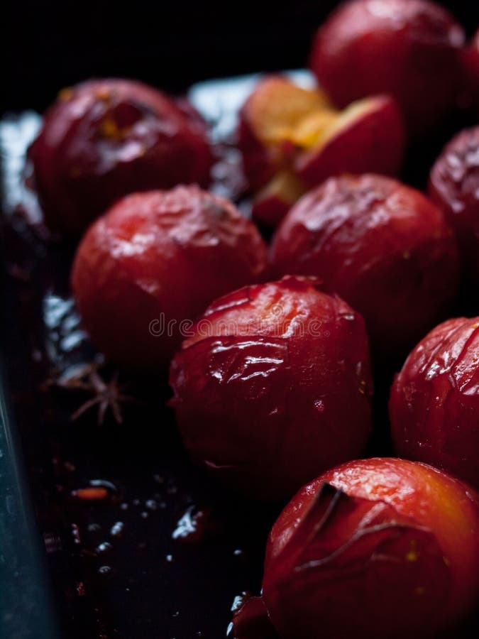 Roasted Plums with Star Anise Fresh from the Oven. Stock Image Image