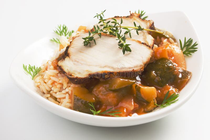 Roasted pork loin with rice ande vegetables