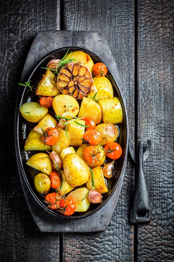 Roasted Potato with Fresh Tomato and Garlic Stock Image Image of