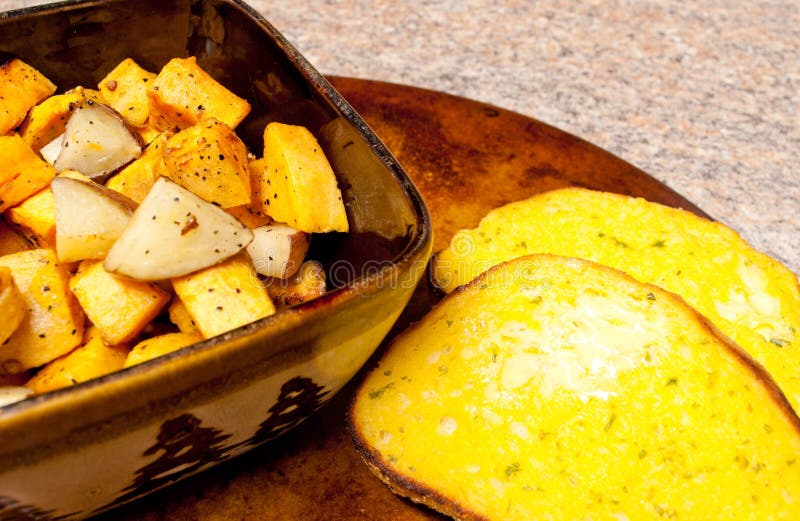 Roasted Potatoes with Garlic Bread Stock Image Image of toasted