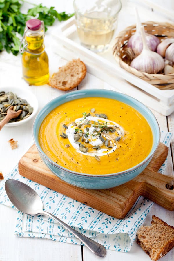 Roasted Pumpkin And Carrot Soup With Cream . Stock Photo - Image of ...