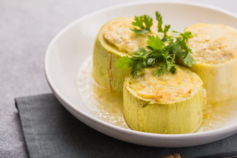 Roasted Round Zucchini Stuffed with Minced Meat, Vegetables, and Cheese
