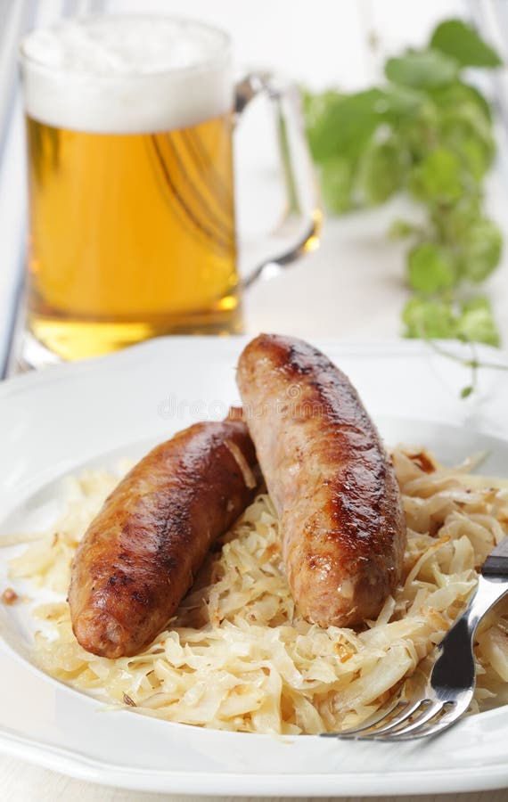 Roasted sausages and beer stock image. Image of cabbage 19764535