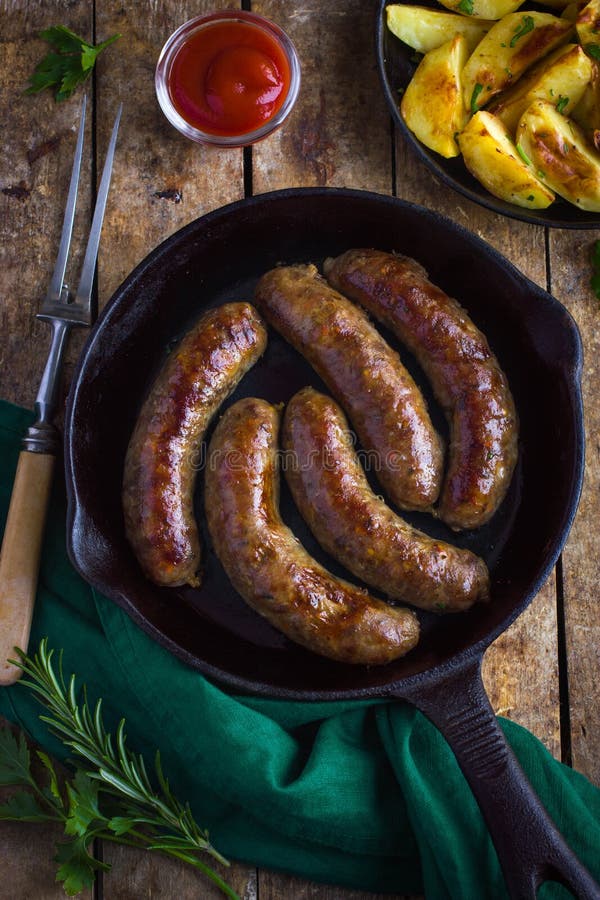 Roasted Sausages on Cast Iron Pan Stock Photo Image of cooking, fried