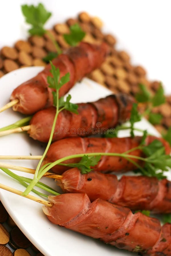 Roasted sausages with parsley