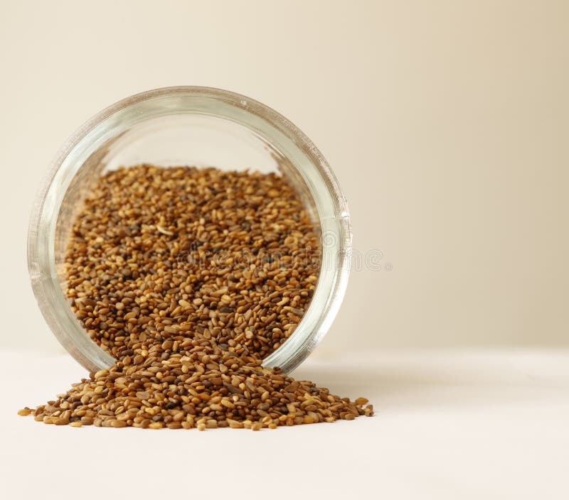 Roasted Sesame Seeds Pouring from a Jar. Stock Photo Image of asian