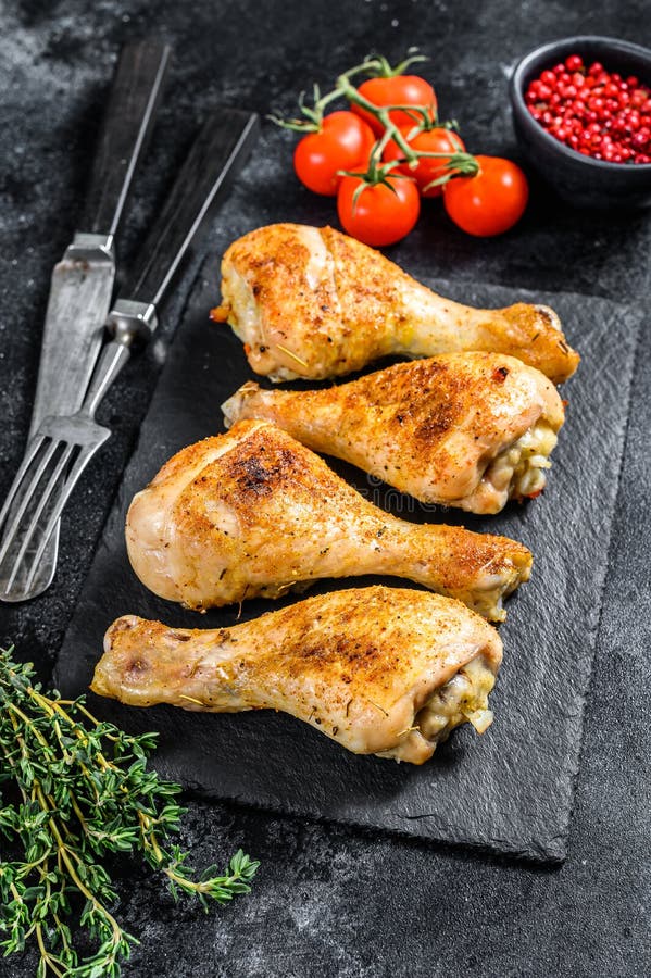 Roasted Spicy Chicken Drumstick, Shanks with Spices and Herbs. Black ...