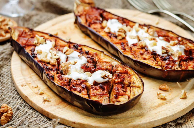 Roasted Spicy Eggplants with Greek Yogurt Walnuts Topping Stock Image