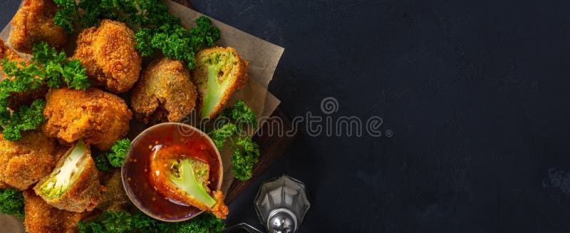 Roasted vegan snack Buffalo wings made broccoli top view. Tasty vegetarian food top view stock images
