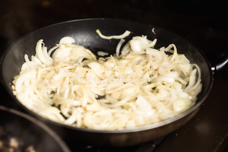 Roasting Onions. Chopped Onions are Fried in a Pan Stock Image Image