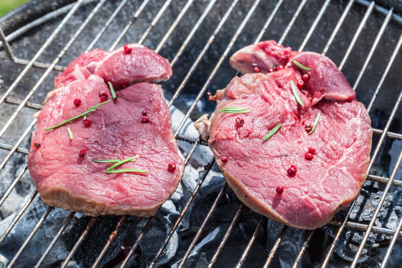 Roasting Red Beef with Rosemary on Grill Stock Photo Image of grid, roast 53929254