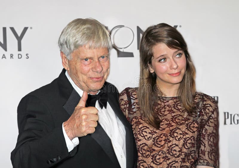 Actor Robert Morse arrives with a guest on the red carpet for the 65th Annual Tony Awards at the Beacon Theatre in New York City on June 12, 2011. In 2011 a successful revival was mounted of the legendary Broadway musical , `How to Succeed in Business Without Really Trying.` Morse won a Tony for his leading role in the original production 50 years earlier, in 1961. Morse`s acting and singing career on stage, screen, and television lasted nearly 7 decades.  He won a second Tony for `Tru,` playing the role of Truman Capote in a 1-man show in 1989.  Morse also won a SAG Award and 2 Primetime Emmys.  He was part of the Emmy for Ensemble Acting in a tv drama, playing the role of `Bertram Cooper` in `Madmen.  Morse was playing a prominent role on Broadway as recently as 2015-2016, playing `Mr. Pincus` in `The Front Page.`  Morse died in his Los Angeles after a short illness on April 20, 2022, at the age of 90. Actor Robert Morse arrives with a guest on the red carpet for the 65th Annual Tony Awards at the Beacon Theatre in New York City on June 12, 2011. In 2011 a successful revival was mounted of the legendary Broadway musical , `How to Succeed in Business Without Really Trying.` Morse won a Tony for his leading role in the original production 50 years earlier, in 1961. Morse`s acting and singing career on stage, screen, and television lasted nearly 7 decades.  He won a second Tony for `Tru,` playing the role of Truman Capote in a 1-man show in 1989.  Morse also won a SAG Award and 2 Primetime Emmys.  He was part of the Emmy for Ensemble Acting in a tv drama, playing the role of `Bertram Cooper` in `Madmen.  Morse was playing a prominent role on Broadway as recently as 2015-2016, playing `Mr. Pincus` in `The Front Page.`  Morse died in his Los Angeles after a short illness on April 20, 2022, at the age of 90.