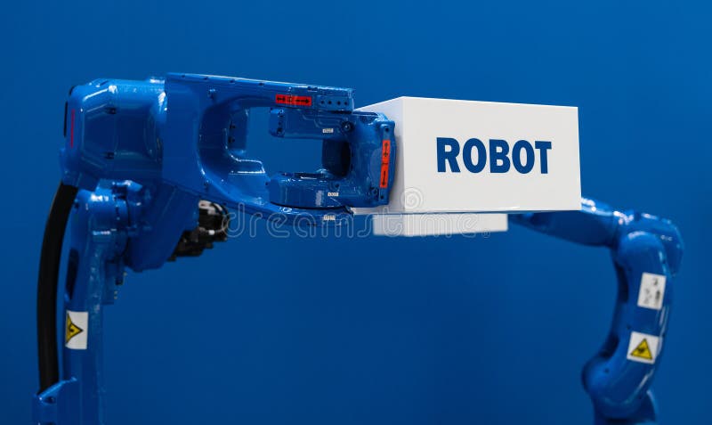 Robot arm with box and text ROBOT. Smart industry concept. High quality photo