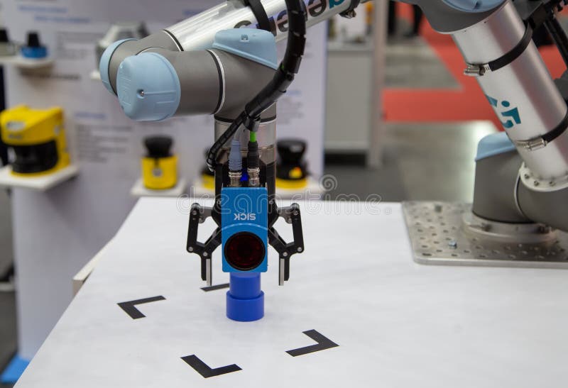 Robot arm perform loading / unloading object stock photography