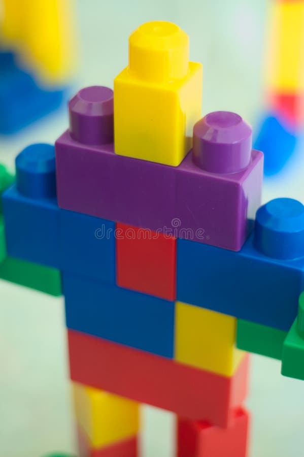 A children building blocks toy stacked as a robot. Can be used for alien or robot invation concept. More in my gallery. A children building blocks toy stacked as a robot. Can be used for alien or robot invation concept. More in my gallery.