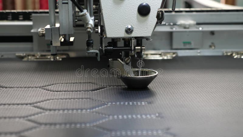 Robot sewing machine. automatic sewing machine. Robotics works in the tailoring production line. The computer controls stock illustration Robot sewing machine. automatic sewing machine. Robotics works in the tailoring production line. The computer controls stock illustration