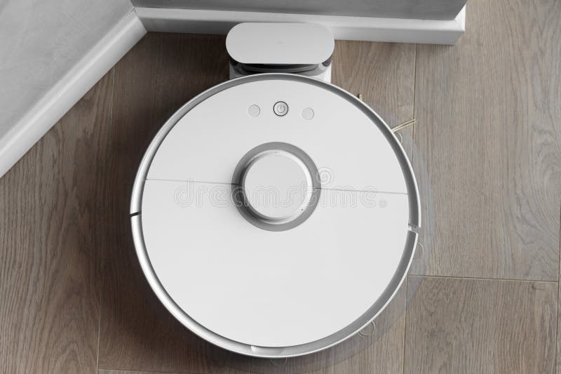 Robot Vacuum Cleaner Connected To Charging Station Stock Photo Image