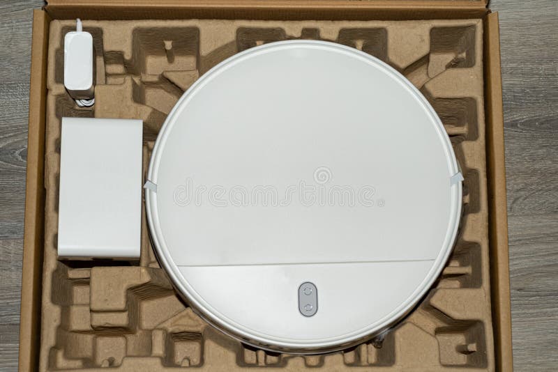 Robot Vacuum Cleaner in an Open Cardboard Box Stock Photo Image of