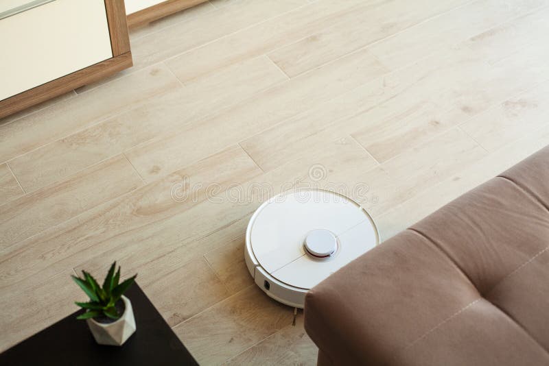 Robot Vacuum Cleaner Performs Automatic Cleaning Of The Apartment