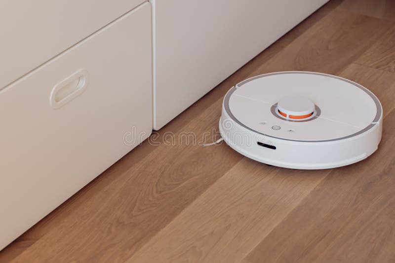 Robot Vacuum Cleaner Performs Automatic Cleaning of the Apartment Smart