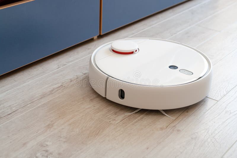 Robotic Vacuum Cleaner on Laminate Wood Floor Stock Photo Image of