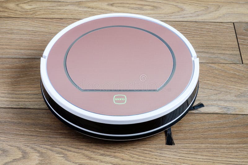 Robotic Vacuum Cleaner on Wood Floor Smart Cleaning Technology Stock