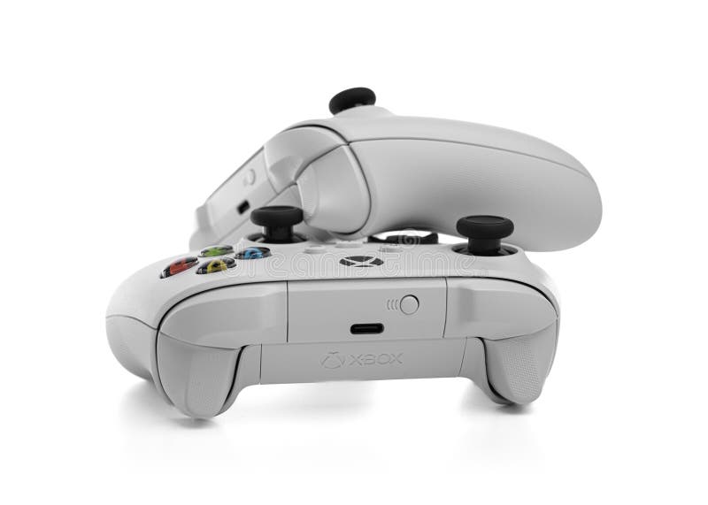 Robotvit trådlöst spel i den trådlösa mikromjuka xbox-styrenheten royaltyfri bild