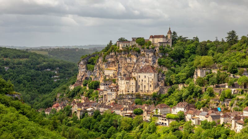 Rocamadour, a village in southwestern France. The sanctuary here has attracted pilgrims from many countries for centuries landscape building castle city beautiful view medieval rock old french europe mountain stone hill architecture landmark tourism travel heritage historic scenic destination town ancient high cliff monastery chateau citadel lot gorge chapel pilgrimage midi-pyrenees dordogne. Rocamadour, a village in southwestern France. The sanctuary here has attracted pilgrims from many countries for centuries landscape building castle city beautiful view medieval rock old french europe mountain stone hill architecture landmark tourism travel heritage historic scenic destination town ancient high cliff monastery chateau citadel lot gorge chapel pilgrimage midi-pyrenees dordogne