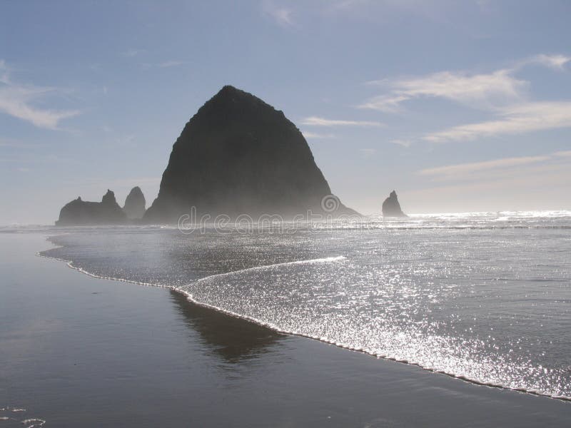 Haystack Rock, Oregon is the third largest coastal monolith in the world. It is a designated marine and bird sanctuary. Haystack Rock, Oregon is the third largest coastal monolith in the world. It is a designated marine and bird sanctuary.