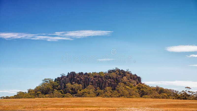 Rocha de suspensão, escalas de Macedon da montagem imagens de stock Rocha de suspensão, escalas de Macedon da montagem imagens de stock