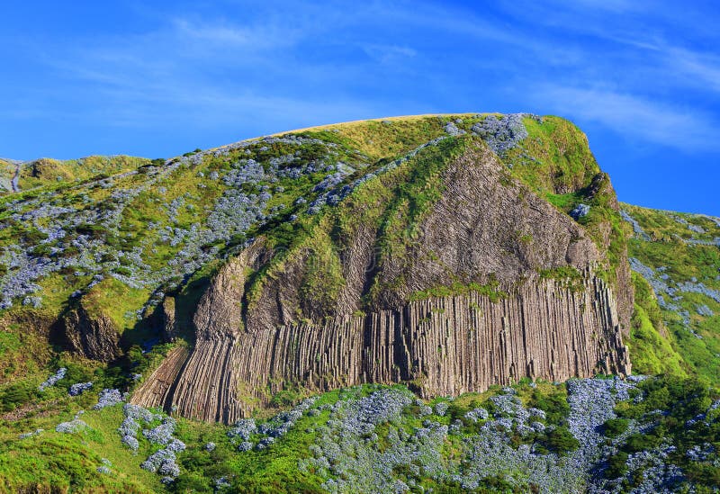 Rocha dos Bordoes - Bordoes Rock - Famous landmark of Flores Island, Azores, Portugalia, Europe. Rocha dos Bordoes - Bordoes Rock - Famous landmark of Flores Island, Azores, Portugalia, Europe