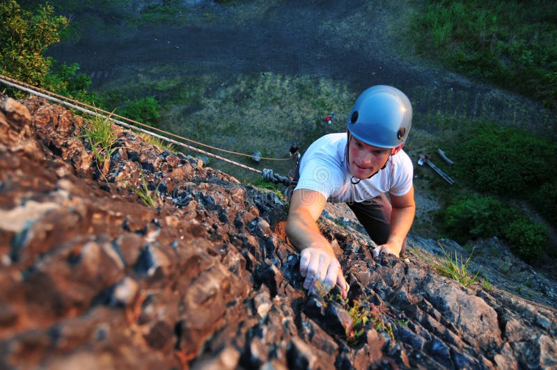 Rock climber ascending royalty free stock images Rock climber ascending royalty free stock images