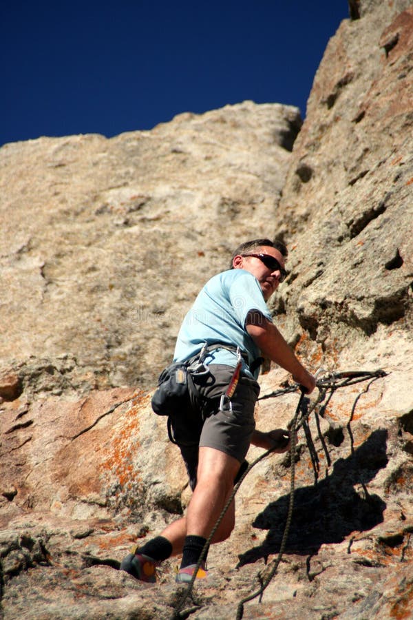 Rock climber on cliff