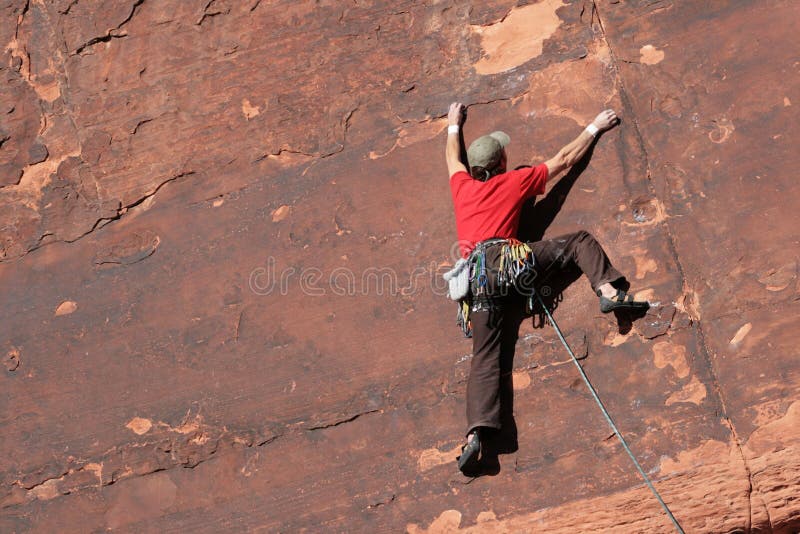 Rock climber on cliff