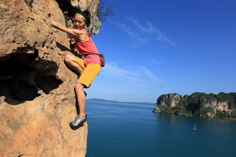 Rock Climber Climbing at Seaside Cliff Stock Photo Image of