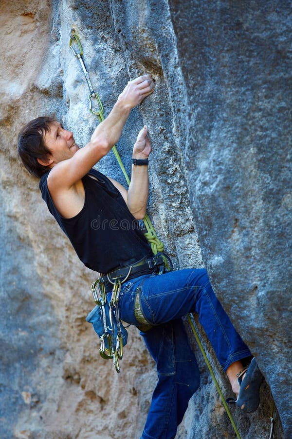 Rock Climber Climbing Up a Cliff Stock Photo Image of hiking, alps