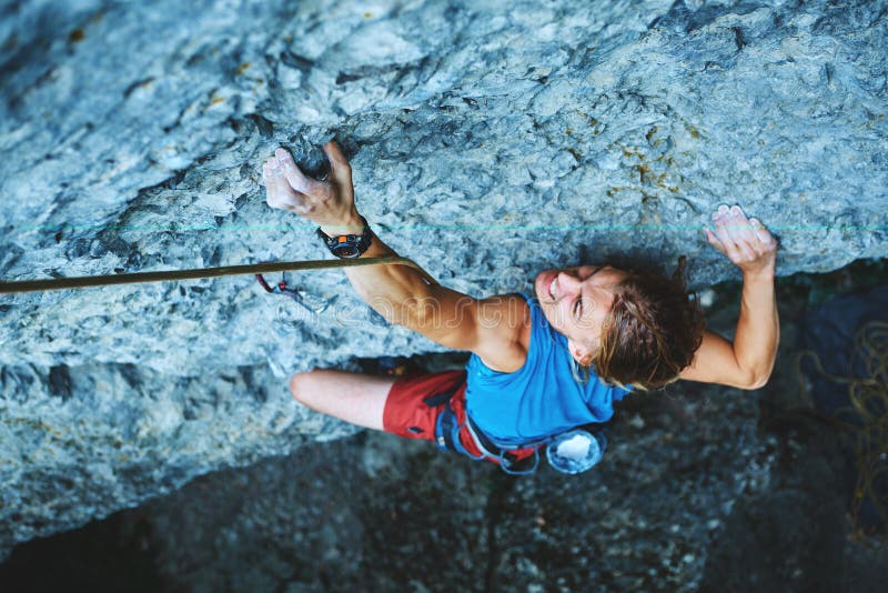 Rock Climbing. Man Rock Climber Climbing the Challenging Route on the ...