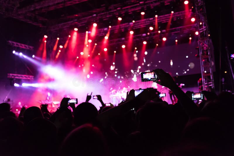 Rock Concert, Silhouettes of Happy People Raising Up Hands Stock Photo ...