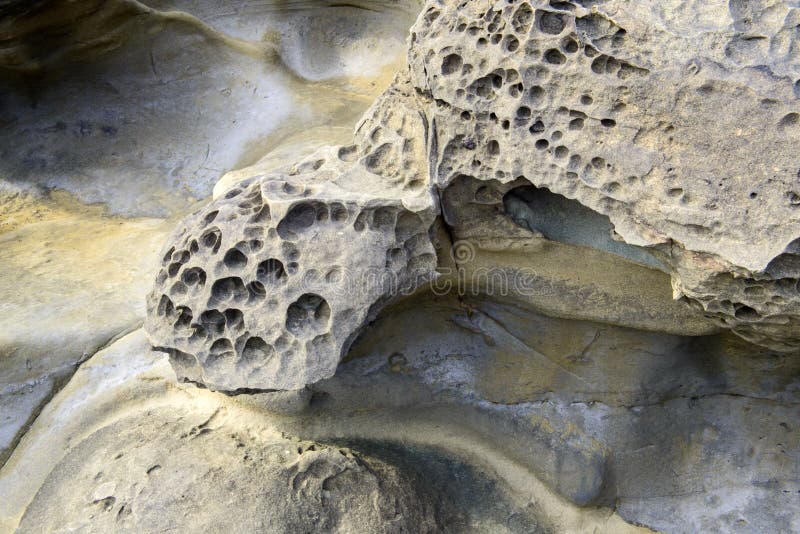 Rock Erosion Holes at Beach Stock Photo - Image of geology, pattern ...