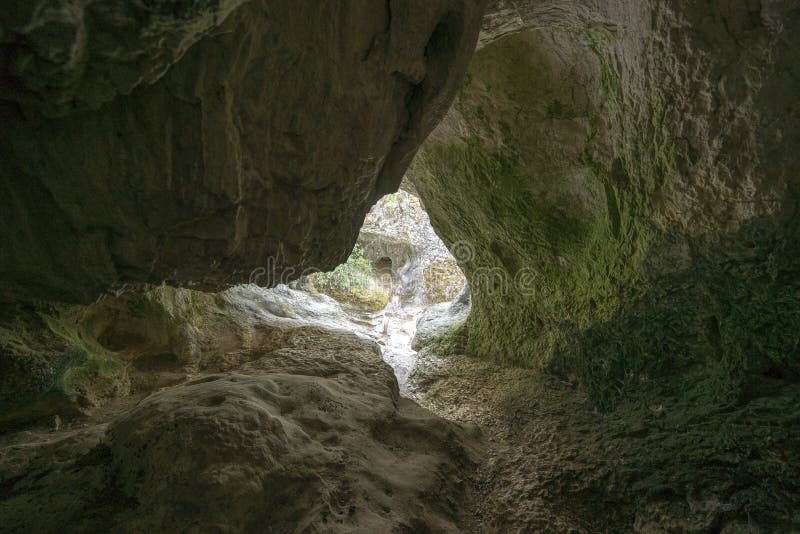 rock formations of cavernous form belonging to the source of the river Alviela where it is possible to watch the water flow.