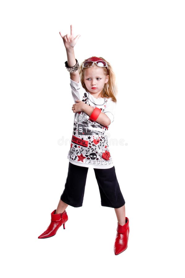 Young caucasian girl playing rock n roll dress up
